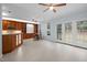 Spacious living room area featuring built-in shelving and French doors leading to the backyard at 11011 Southwalk Ln, Raleigh, NC 27614