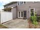 Outdoor patio featuring double doors and siding at 11011 Southwalk Ln, Raleigh, NC 27614