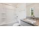 Full bathroom features a shower-tub combo with a granite countertop vanity at 111 Artic Circle, Garner, NC 27529