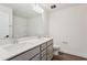 Bathroom featuring double sink vanity with quartz countertop and modern fixtures at 111 Artic Circle, Garner, NC 27529