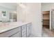 Bathroom featuring double sinks, modern cabinetry, and a glass-enclosed shower at 111 Artic Circle, Garner, NC 27529