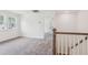 Bright, carpeted bedroom with white trim and natural light from a large window at 111 Artic Circle, Garner, NC 27529