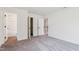 Bedroom with neutral carpet with access to bathroom and closet at 111 Artic Circle, Garner, NC 27529
