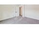 Bedroom featuring neutral carpet and double door closet at 111 Artic Circle, Garner, NC 27529