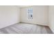 Bedroom with neutral carpet and natural light from a single window at 111 Artic Circle, Garner, NC 27529