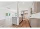 Modern kitchen featuring an island, stainless steel appliances, and open access to living space at 111 Artic Circle, Garner, NC 27529