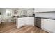 Bright kitchen with stainless steel dishwasher and view to the dining room at 121 Viajar Way, Smithfield, NC 27577