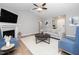 Bright living room featuring a fireplace, comfortable seating, and neutral tones at 121 Viajar Way, Smithfield, NC 27577