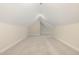 Carpeted attic space with multiple areas branching off the central section at 1221 Azalea Garden Cir, Raleigh, NC 27603