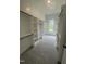 Spacious walk-in closet with ample shelving and natural light offers great organizational solutions at 1221 Azalea Garden Cir, Raleigh, NC 27603