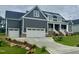 Beautiful home featuring two-car garage, well maintained lawn, and an inviting covered porch at 1221 Azalea Garden Cir, Raleigh, NC 27603