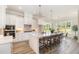Gourmet kitchen boasts a large island with seating, pendant lighting, and ample counter space at 1221 Azalea Garden Cir, Raleigh, NC 27603