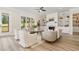 Cozy living room features a fireplace, built-in shelving, and plenty of natural light at 1221 Azalea Garden Cir, Raleigh, NC 27603