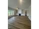 Spacious living room with built-in shelves, fireplace, and lots of natural light at 1221 Azalea Garden Cir, Raleigh, NC 27603