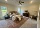 Serene main bedroom featuring a comfortable king-sized bed, and large windows at 1221 Azalea Garden Cir, Raleigh, NC 27603