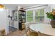 Bright dining space with natural light from the window, complemented by neutral decor at 1332 Stallings Rd, Chapel Hill, NC 27516