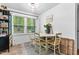 Cozy dining area featuring natural light and views of the surrounding landscape at 1332 Stallings Rd, Chapel Hill, NC 27516