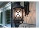 Close-up of an outdoor lantern on the side of the house at 1332 Stallings Rd, Chapel Hill, NC 27516