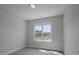Bright bedroom featuring a large window that brings in plenty of natural light at 163 S Harper Faith Way, Benson, NC 27504