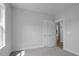 Neutral bedroom with wall-to-wall carpeting and white doors and trim at 163 S Harper Faith Way, Benson, NC 27504