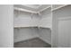 Walk-in closet featuring ample shelving and storage options, designed for organization at 163 S Harper Faith Way, Benson, NC 27504