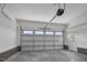 Spacious garage with an automatic door, side entry and painted floor at 163 S Harper Faith Way, Benson, NC 27504
