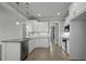 Open concept kitchen with a large island, stainless steel appliances, and lots of cabinets at 163 S Harper Faith Way, Benson, NC 27504