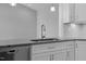 Modern kitchen with granite countertops, subway tile backsplash, and a stainless steel dishwasher at 163 S Harper Faith Way, Benson, NC 27504