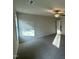 Cozy main bedroom with plush carpet, neutral walls, and a ceiling fan for added comfort at 170 Eason Creek Way, Clayton, NC 27527