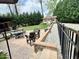 Beautiful backyard featuring a fire pit, seating, landscaping, and manicured lawn at 1802 Greenbriar Rd, Henderson, NC 27536