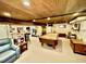 This finished basement has a wood ceiling, pool table and plenty of space for entertaining at 1802 Greenbriar Rd, Henderson, NC 27536
