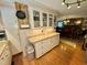 Spacious kitchen with granite countertops and glass-front cabinets that offer ample storage at 1802 Greenbriar Rd, Henderson, NC 27536
