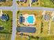 Aerial view of community pool with ample parking and surrounding greenery at 181 Fawn Hill Ct, Garner, NC 27529