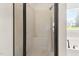 Shower with glass door in a bright bathroom at 181 Fawn Hill Ct, Garner, NC 27529