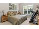 Comfortable bedroom with a large window and treadmill at 181 Fawn Hill Ct, Garner, NC 27529