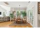 Casual dining area with natural light and views of the outdoors, hardwood floors at 181 Fawn Hill Ct, Garner, NC 27529