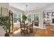 Charming dining area with natural light and view of outside, ideal for Gathering meals and gatherings at 181 Fawn Hill Ct, Garner, NC 27529