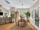 Bright dining area adjacent to living room with natural light and view of outside, ideal for Gathering meals at 181 Fawn Hill Ct, Garner, NC 27529