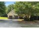 Charming two-story home featuring a two-car garage and a beautifully landscaped front yard at 181 Fawn Hill Ct, Garner, NC 27529