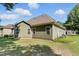 Side elevation of home shows multiple windows at 181 Fawn Hill Ct, Garner, NC 27529