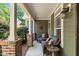 Inviting front porch with cozy seating, perfect for relaxing at 181 Fawn Hill Ct, Garner, NC 27529