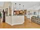 Spacious open kitchen with stainless appliances, granite countertops and seating area for entertaining at 181 Fawn Hill Ct, Garner, NC 27529