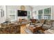 Comfortable living room with a large TV and cozy seating at 181 Fawn Hill Ct, Garner, NC 27529