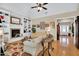 Cozy living room with a fireplace and built-in shelves, perfect for relaxing and entertaining guests at 181 Fawn Hill Ct, Garner, NC 27529