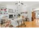 Spacious living room with built-in shelving, a fireplace, and hardwood flooring at 181 Fawn Hill Ct, Garner, NC 27529