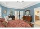 Beautiful main bedroom with ensuite bathroom, dresser, and sitting chair at 181 Fawn Hill Ct, Garner, NC 27529