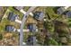 Aerial view of a home featuring a deck, patio set, playground, fenced backyard, and green grassy lawn at 189 Grey Hawk Dr, Garner, NC 27529