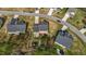 Aerial view of a house featuring a fenced in yard with a playground, deck, and patio set at 189 Grey Hawk Dr, Garner, NC 27529