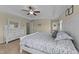 This bright main bedroom boasts lots of closet space and windows for natural light at 189 Grey Hawk Dr, Garner, NC 27529