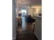 Inviting living room with hardwood floors, leather sofa, and an open floor plan at 1911 Wolftech Ln # 204, Raleigh, NC 27603